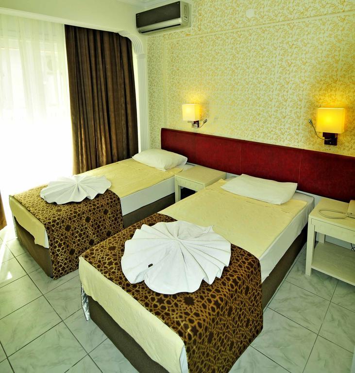 Sun Kiss Hotel Sidé Extérieur photo